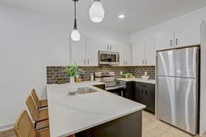 Philadelphia apartment for rent - the preserve at ballantyne commons apartment kitchen and stainless steel refrigerator