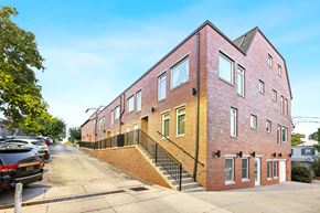 Philadelphia apartment for rent - the side of a brick building with stairs