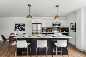 Philadelphia apartment for rent - A modern kitchen with a dining table and chairs.
