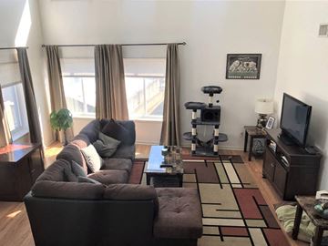 Philadelphia apartment for rent - a living room with a couch and a tv