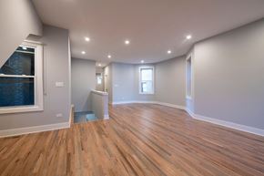 Chicago apartment for rent - a living room with a hard wood floor and a window