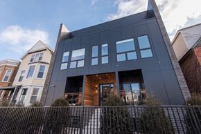 Chicago apartment for rent - a building with a fence in front of it