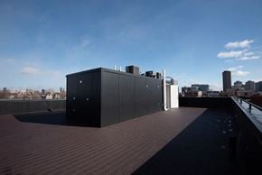 Chicago apartment for rent - the view of the city from the roof of a building