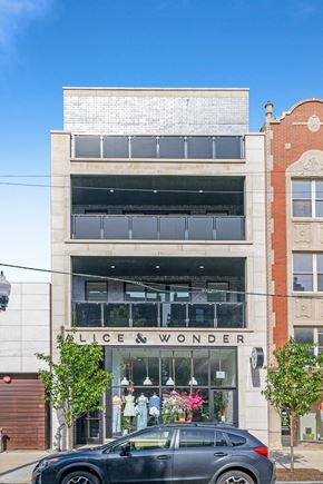 Chicago apartment for rent - a black car parked in front of a building
