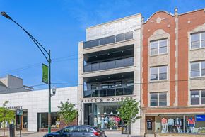 Chicago apartment for rent - a building with a store on the corner of a city street