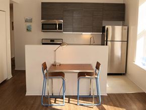 Chicago apartment for rent - a small kitchen with a table and chairs