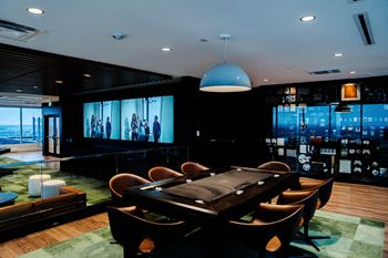 Games room with pool table, ping pong, and poker table