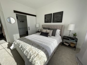 Plainfield apartment for rent - a bedroom with a large bed and a closet