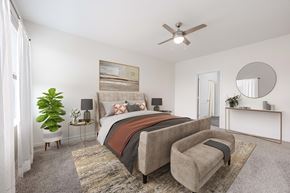 Westfield apartment for rent - A bedroom with a large bed and a ceiling fan.