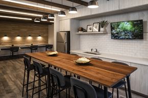 Noblesville apartment for rent - a kitchen and dining room with a wooden table