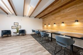 Noblesville apartment for rent - A conference room with a long table and chairs.