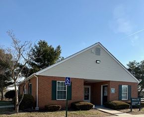 Bridgeville apartment for rent - A small building with a sign on the front.