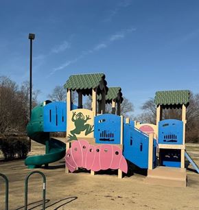Bridgeville apartment for rent - A colorful playground with a slide, swings, and a climbing structure.