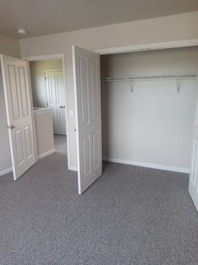 Scranton apartment for rent - a bedroom with a closet and a door open