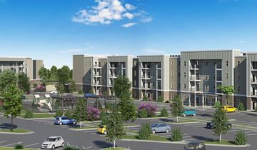Wichita apartment for rent - A rendering of a modern apartment complex with cars parked in the driveway.