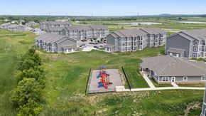 Lawrence apartment for rent - Aerial Play Area View at Union at the Loop, Lawrence, KS, 66046