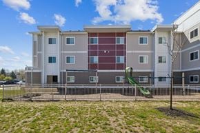 Indianapolis apartment for rent - Apartment building with a playground in front at Union at 16th, Indianapolis, IN