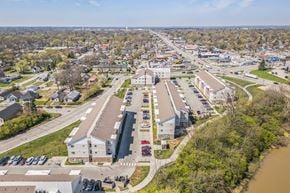 Indianapolis apartment for rent - A bird's eye view of a town with a river running through it at Union at 16th, Indianapolis, IN
