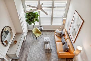 Hempstead apartment for rent - an overhead view of a living room with a couch and a ceiling fan