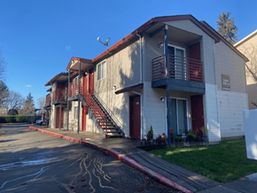 Hillsboro apartment for rent - A building with a red awning and a sign that says "Apartments".