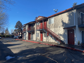 Hillsboro apartment for rent - A row of townhouses with a clear blue sky above.