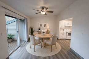 Tualatin apartment for rent - A dining room with a table set for two and a ceiling fan.