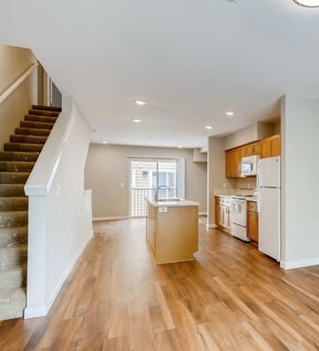 Portland apartment for rent - A kitchen with a refrigerator, dishwasher, and oven is shown.