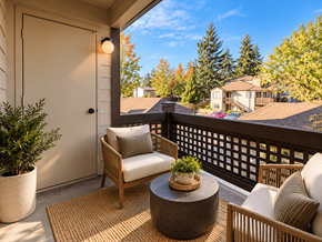 Beaverton apartment for rent - A patio with a chair, table and potted plant.