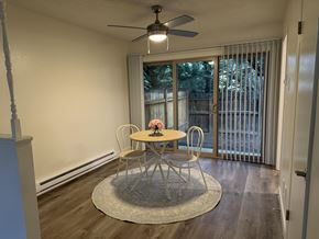 Beaverton townhouse for rent - A dining room with a round table and chairs.