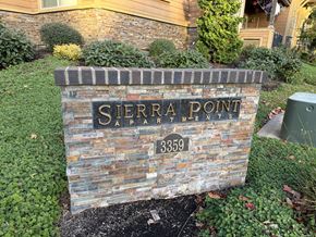 Gresham apartment for rent - A sign that says Sierra Point OAPartment in front of a building.