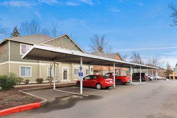 <B>covered parking:</b>  enjoy the convenience of a dedicated covered parking spot.