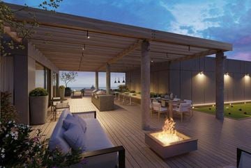 Toronto apartment for rent - A modern outdoor patio area with a fire pit and seating.
