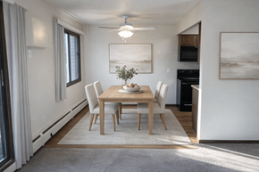 Eden Prairie apartment for rent - A dining room with a table set for four.
