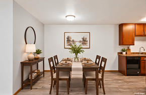 St. Louis Park apartment for rent - A dining room with a table set for a meal.