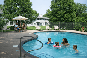 Eden Prairie apartment for rent - A group of people are enjoying a swim in a pool.