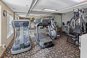 Chaska apartment for rent - A gym with treadmills and exercise machines.