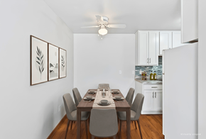 St. Louis Park apartment for rent - A dining room with a table set for six people.