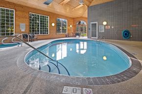 St. Cloud apartment for rent - A round indoor swimming pool with a glass wall surrounding it.