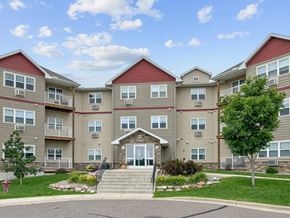 Big Lake apartment for rent - an exterior view of an apartment building with stairs