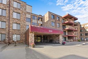 Hopkins apartment for rent - an apartment building with a red awning and a street in front
