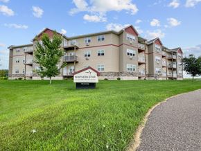 Big Lake apartment for rent - Apartment complex named Northern Star with a sign in front.