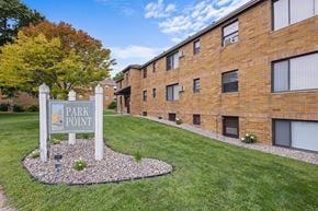St. Louis Park apartment for rent - a park point sign in front of a brick building
