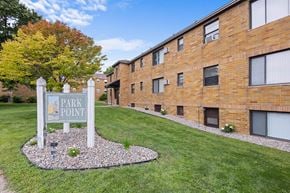 St. Louis Park apartment for rent - a park point sign in front of a brick building