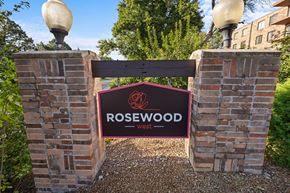 Hopkins apartment for rent - a sign at the entrance to rosewood sign