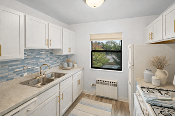 St. Louis Park apartment for rent - A kitchen with a window overlooking a bridge.