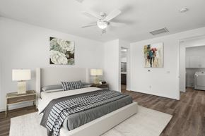 Mesa apartment for rent - A bedroom with two beds and a ceiling fan.