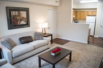 Akron apartment for rent - a living room with a couch and a coffee table