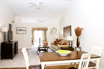 North Ridgeville apartment for rent - a living room and dining room with a table and chairs