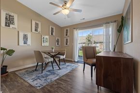 Altoona apartment for rent - A dining room with a table and chairs.