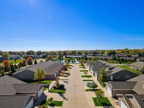 Altoona apartment for rent - A suburban neighborhood with rows of houses and trees.